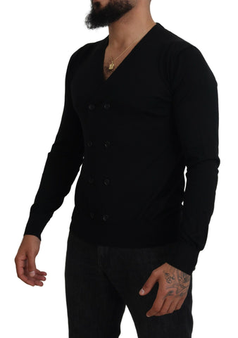 Black Dolce & Gabbana cashmere button-down cardigan sweater displayed on a hanger with a ribbed collar and cuffs.