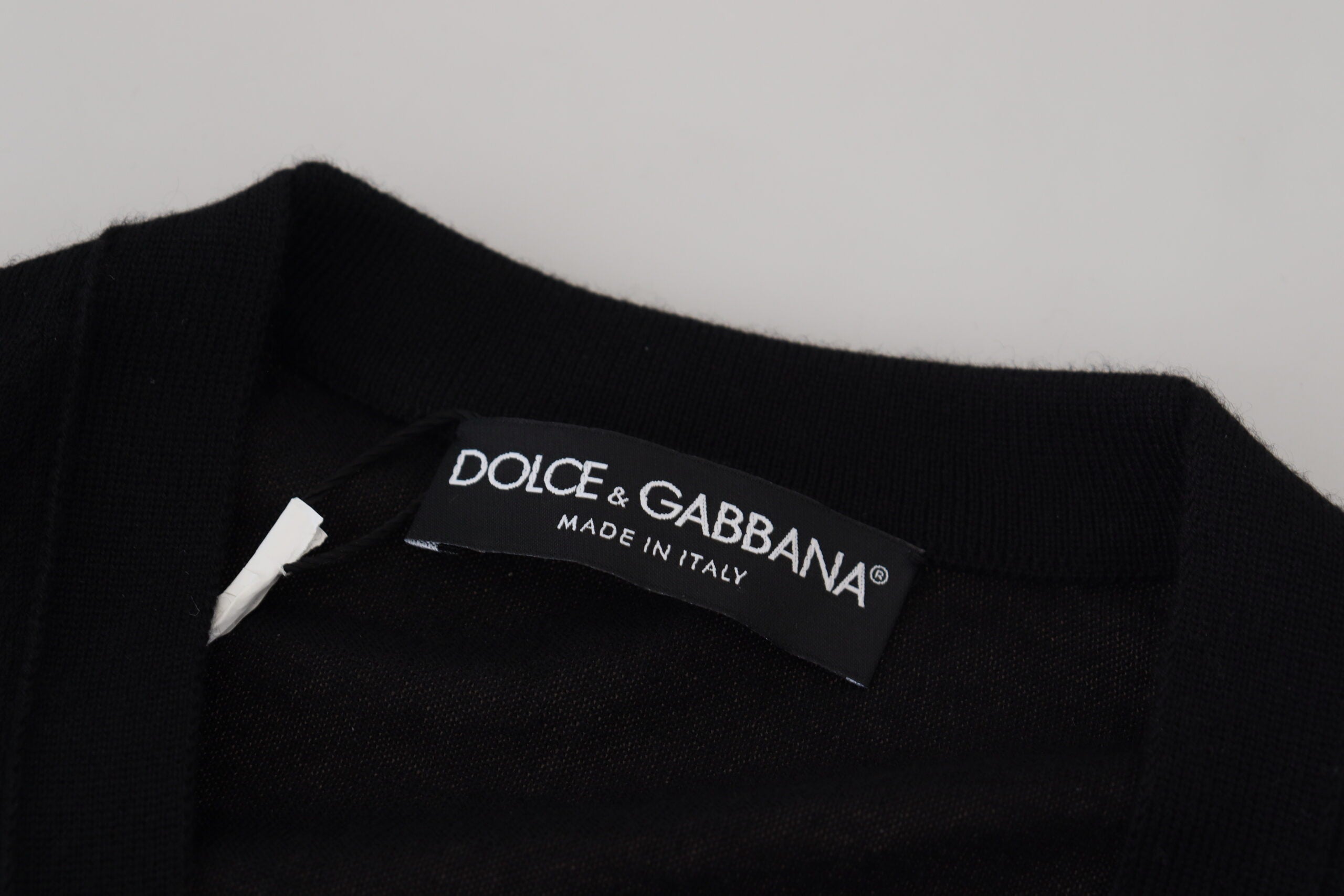 Dolce & Gabbana black cashmere button-down cardigan sweater with front buttons and a cozy, luxurious knit texture.