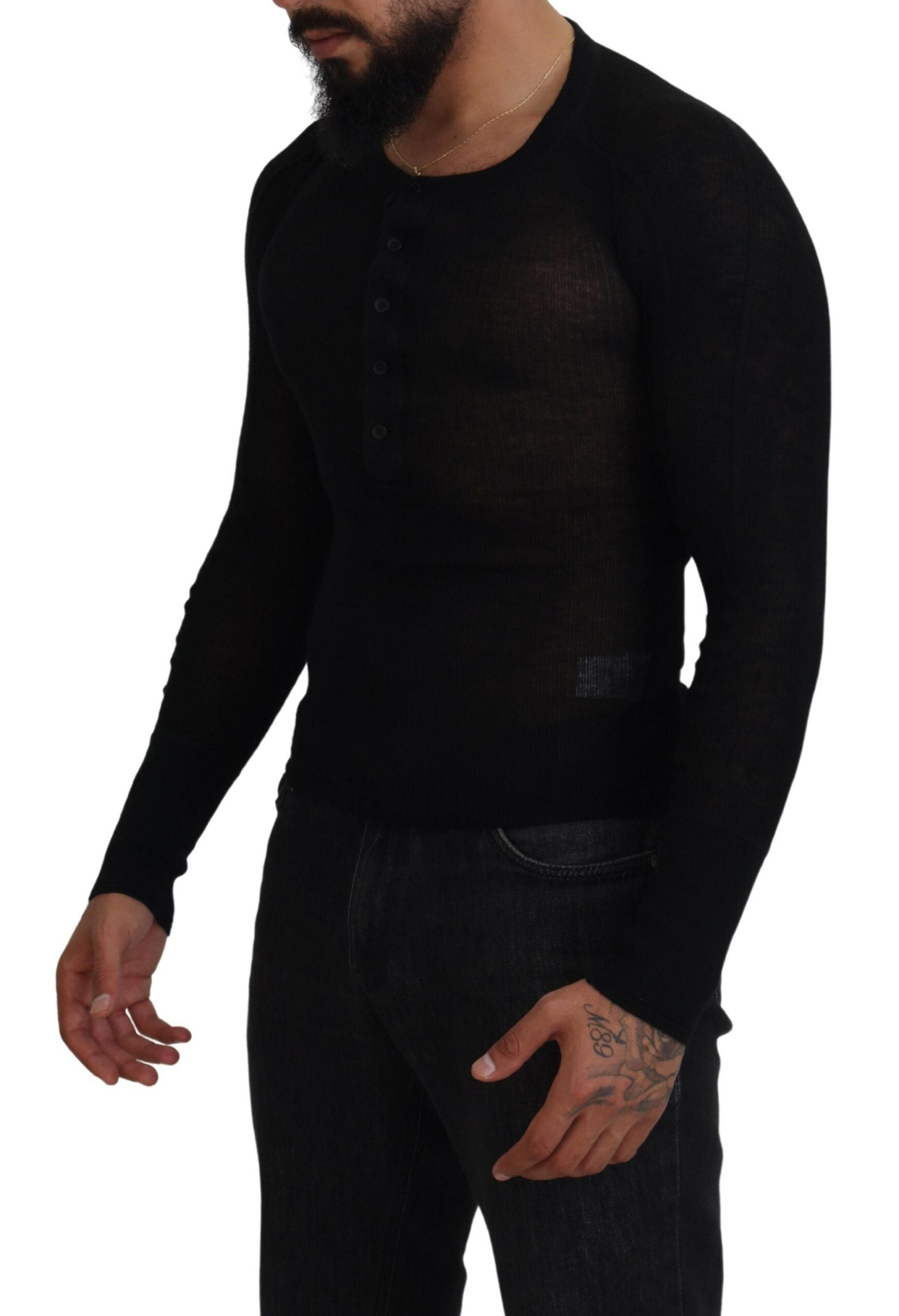 Black cashmere button pullover sweater by Dolce & Gabbana, featuring a classic round neckline and button details.