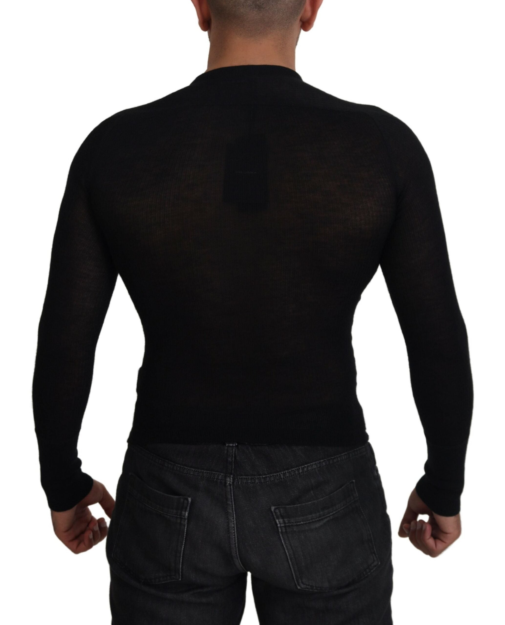 Black cashmere button pullover sweater by Dolce & Gabbana, featuring a classic design with a row of buttons on the front.