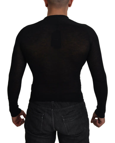 Black cashmere button pullover sweater by Dolce & Gabbana, featuring a classic design with a row of buttons on the front.