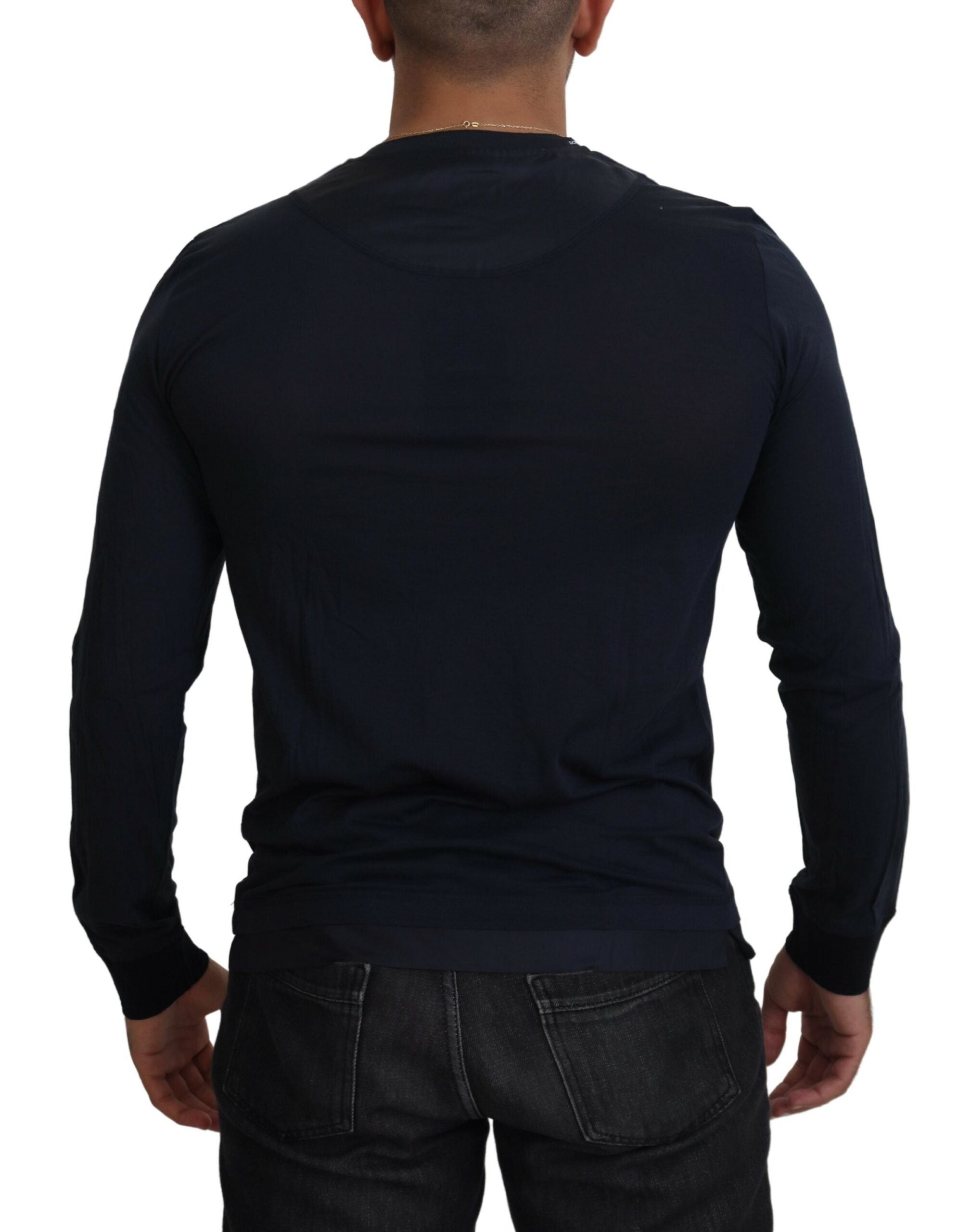 Blue cotton crewneck pullover sweater by Dolce & Gabbana with button detail and classic fit.