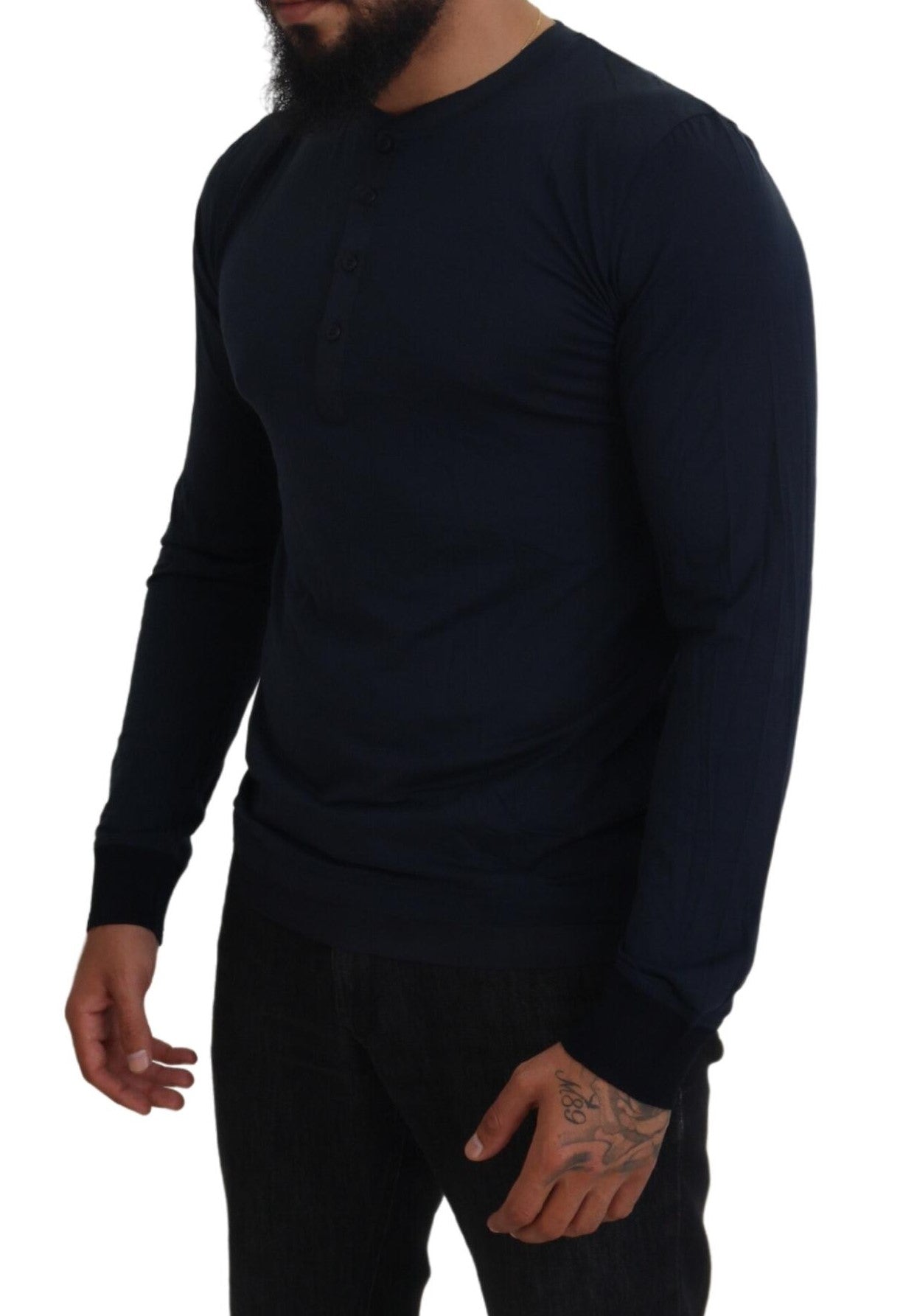 Blue cotton crewneck pullover sweater by Dolce & Gabbana with button detail, displayed flat against a neutral background.