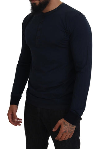Blue cotton crewneck pullover sweater by Dolce & Gabbana with button detail, displayed flat against a neutral background.