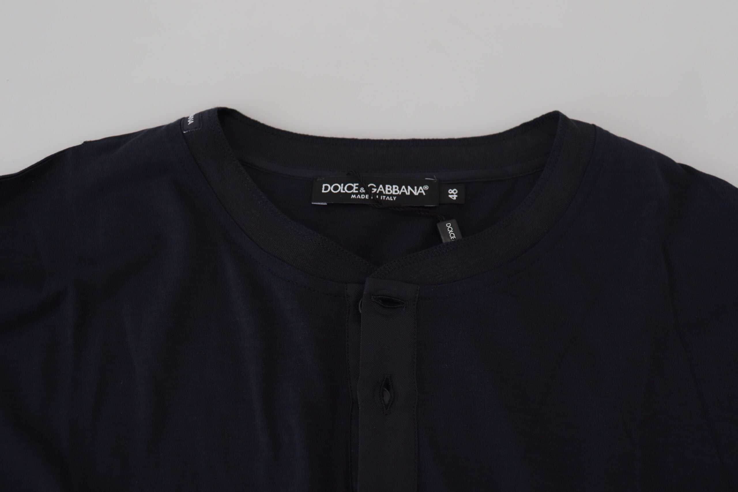 Blue cotton crewneck pullover sweater by Dolce & Gabbana, featuring button details and classic fit.