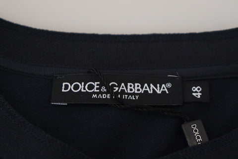 Blue cotton Dolce & Gabbana button crewneck pullover sweater with long sleeves and ribbed cuffs.