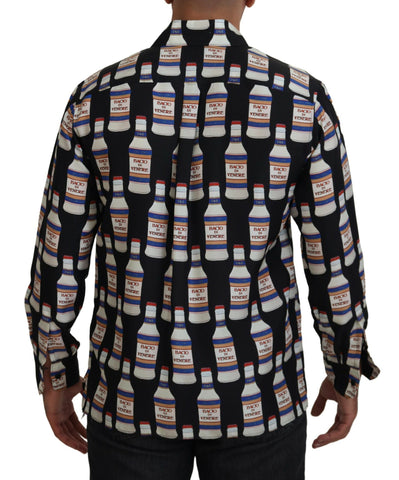 Black silk printed collared men's casual shirt by Dolce & Gabbana with button closure and stylish design.
