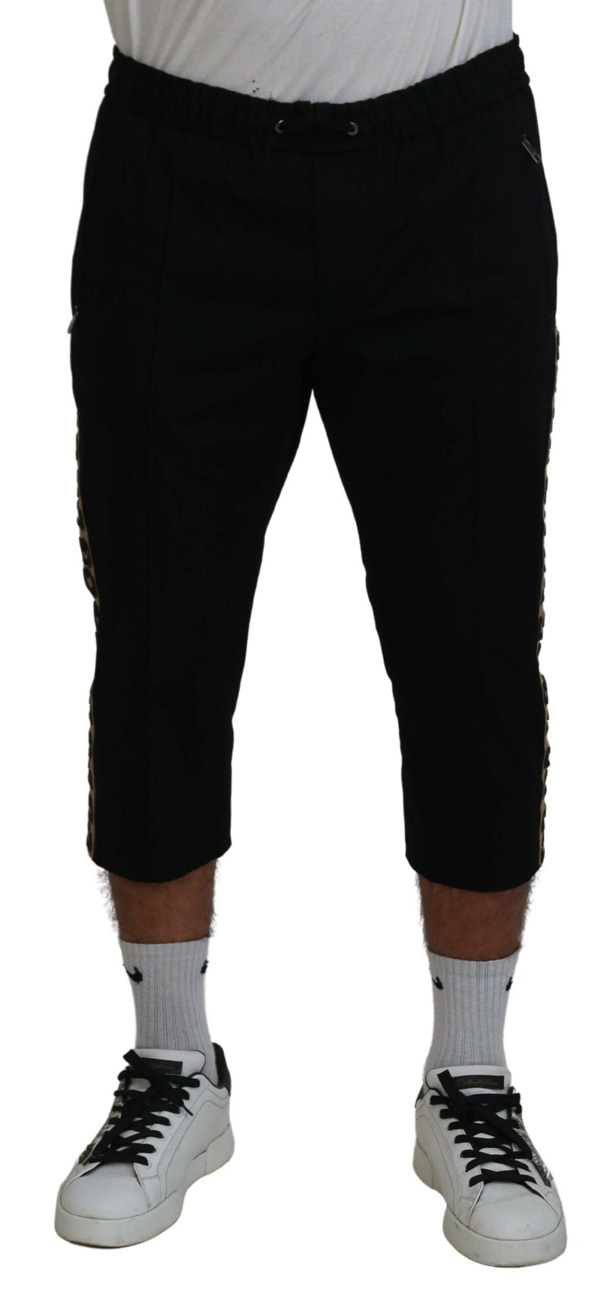 Black cotton elastic waist Dolce & Gabbana logo cropped pants shown, featuring a relaxed fit and stylish design.