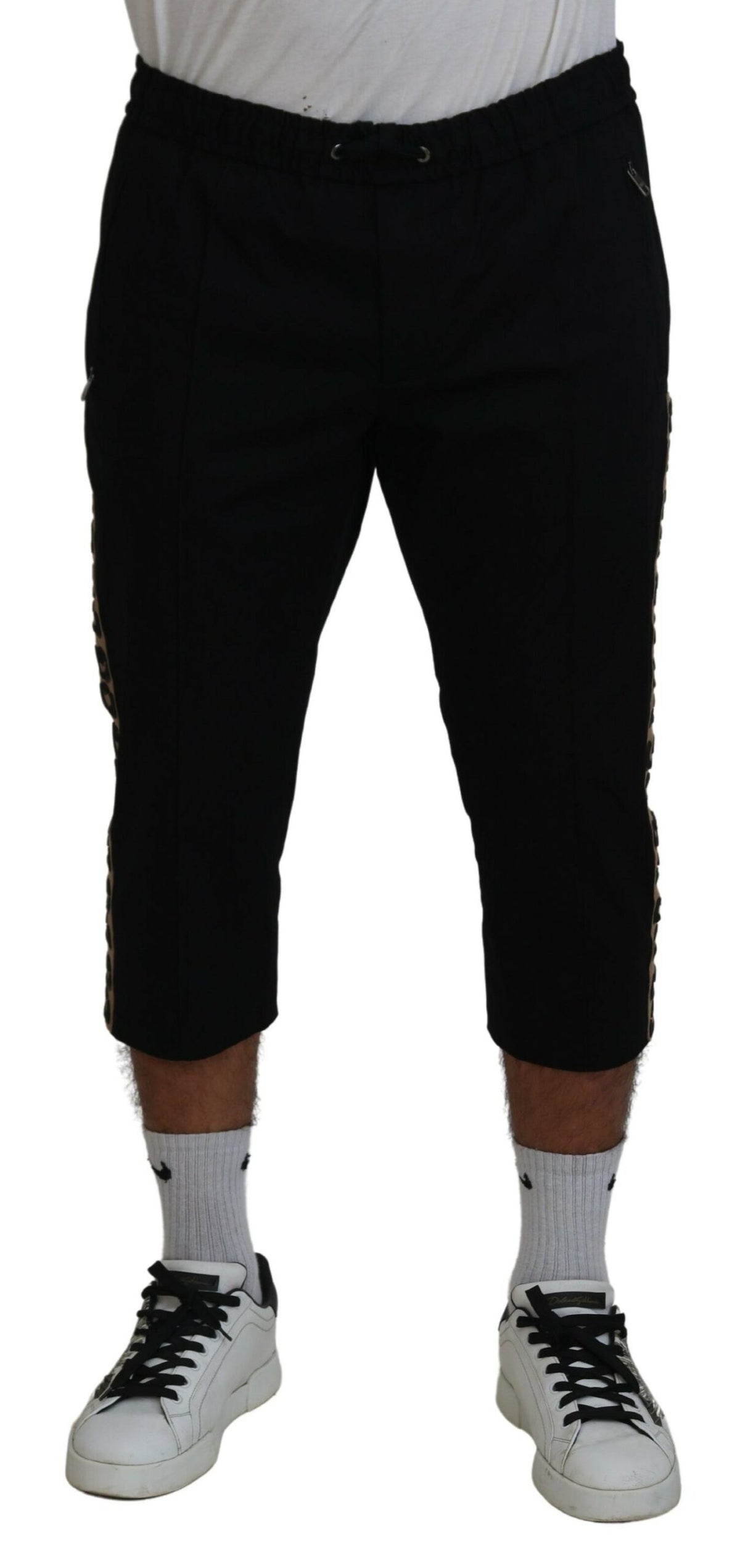 Black cotton elastic waist Dolce & Gabbana logo cropped pants shown, featuring a relaxed fit and stylish design.