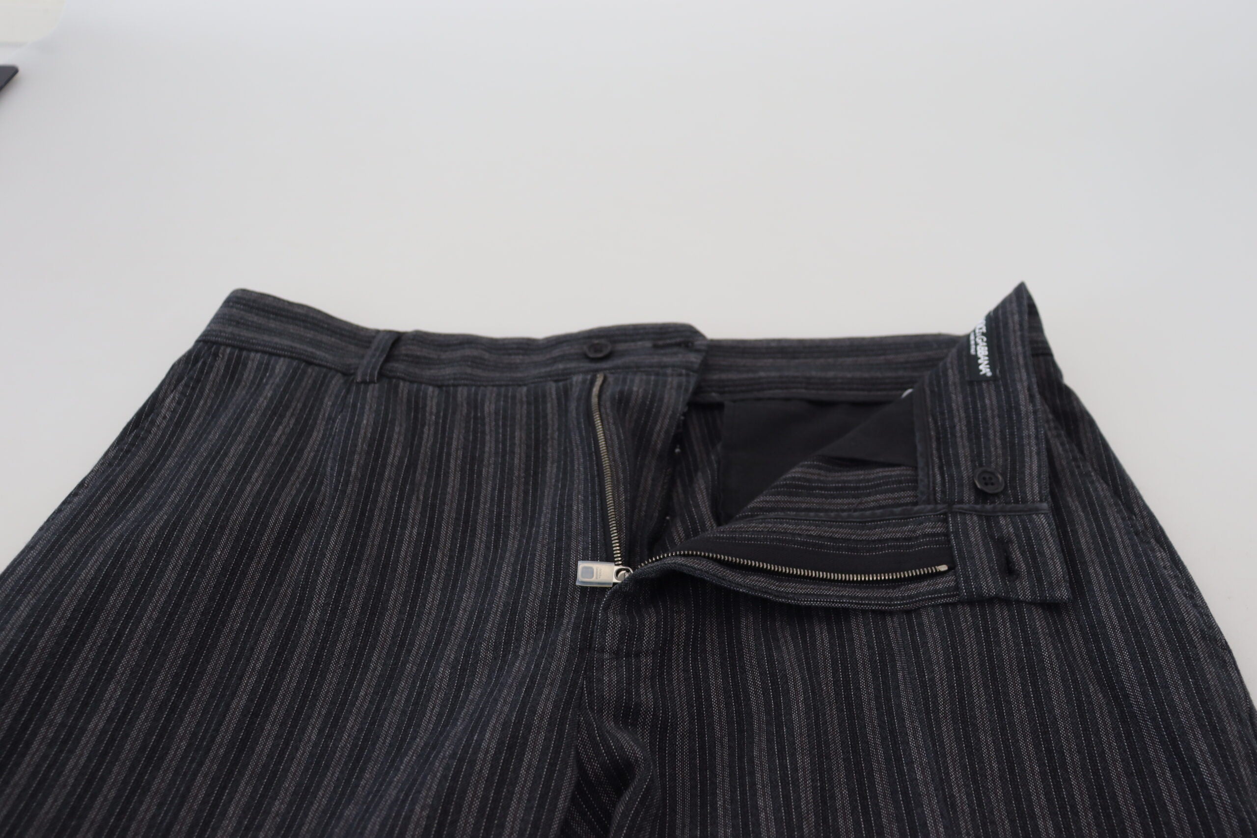 Dark gray striped chino dress pants by Dolce & Gabbana, tailored fit with classic pattern and stylish waistband.