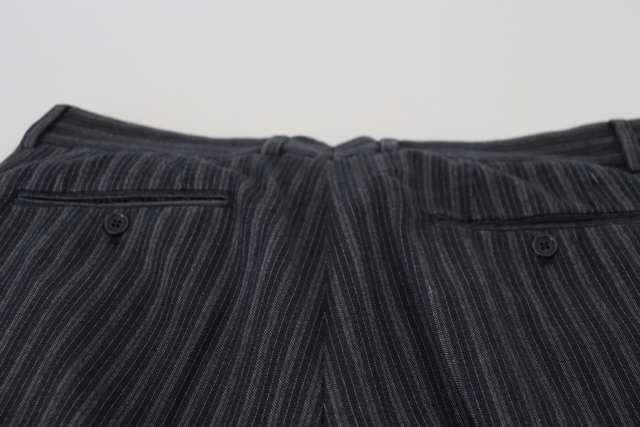 Dark gray striped chino dress pants by Dolce & Gabbana, tailored fit with classic pattern and sleek fabric.