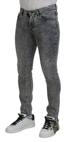 Grey washed cotton slim fit men's denim jeans by Dolce & Gabbana, showing front view with classic five-pocket design.