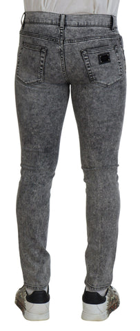 Grey washed cotton slim fit men's denim jeans by Dolce & Gabbana, showing front view with classic five-pocket design.
