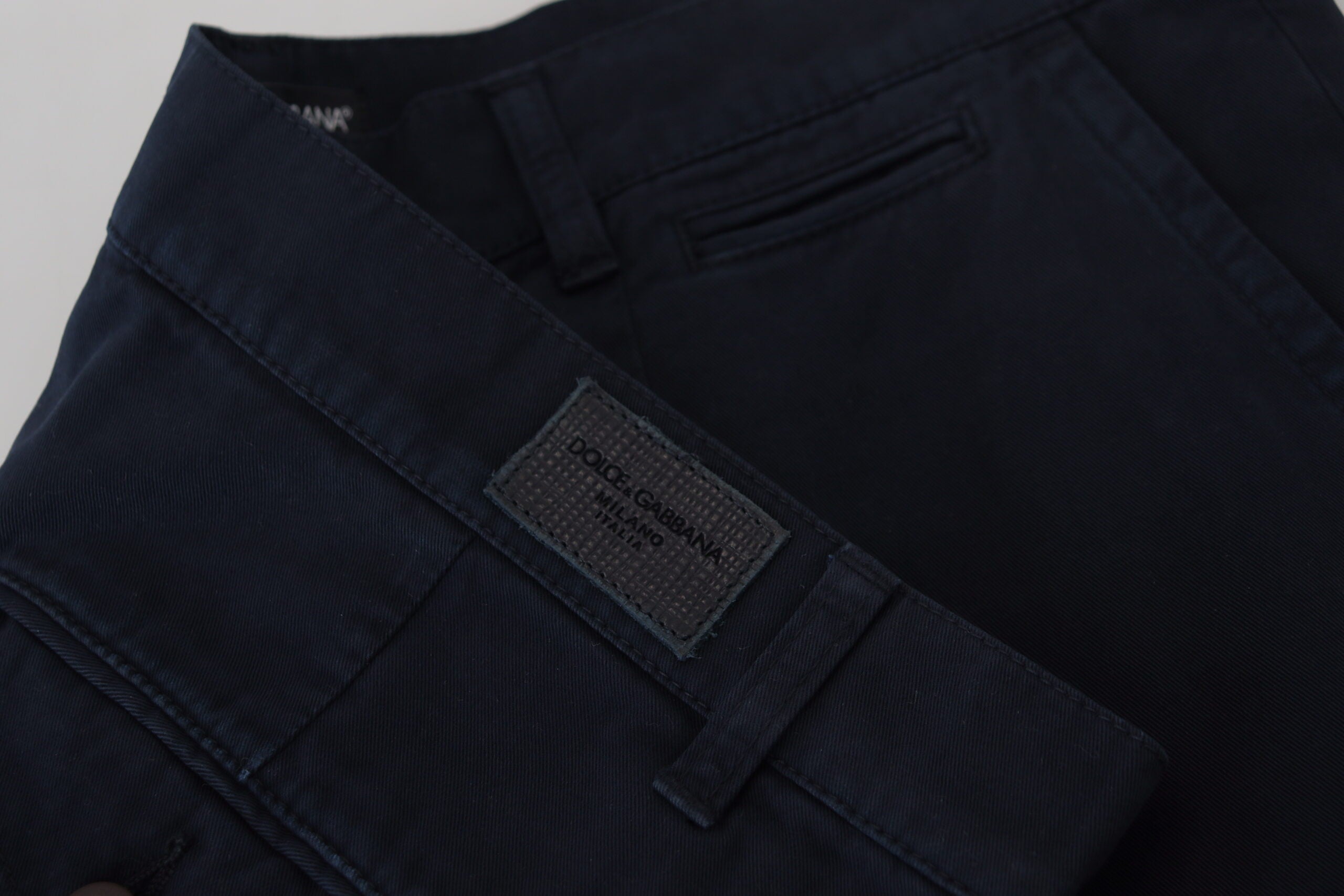 Blue cotton formal men's dress pants by Dolce & Gabbana, shown with a tailored fit and classic design.