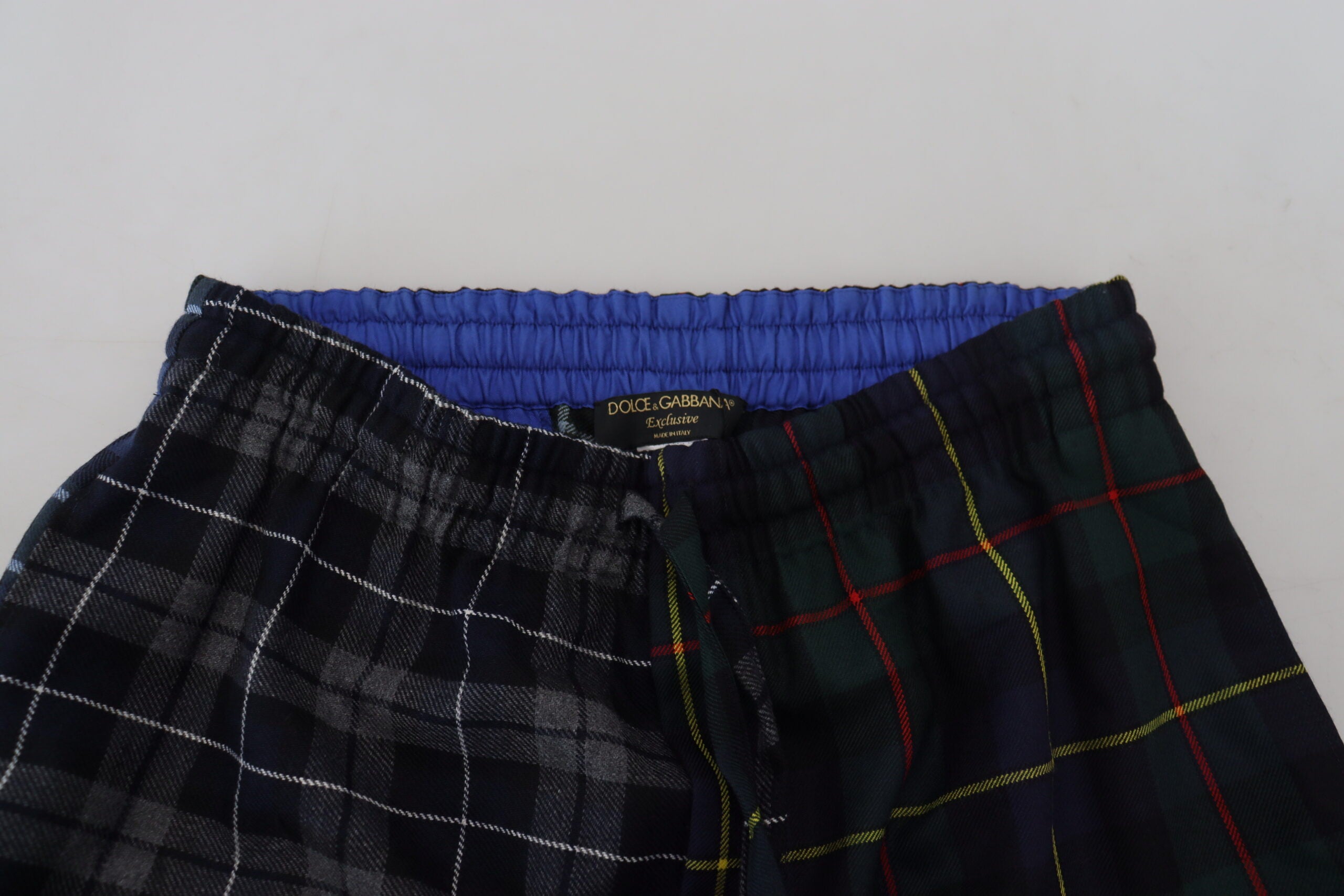 Multicolor checkered wool jogger pants for men by Dolce & Gabbana, featuring a relaxed fit and stylish pattern.