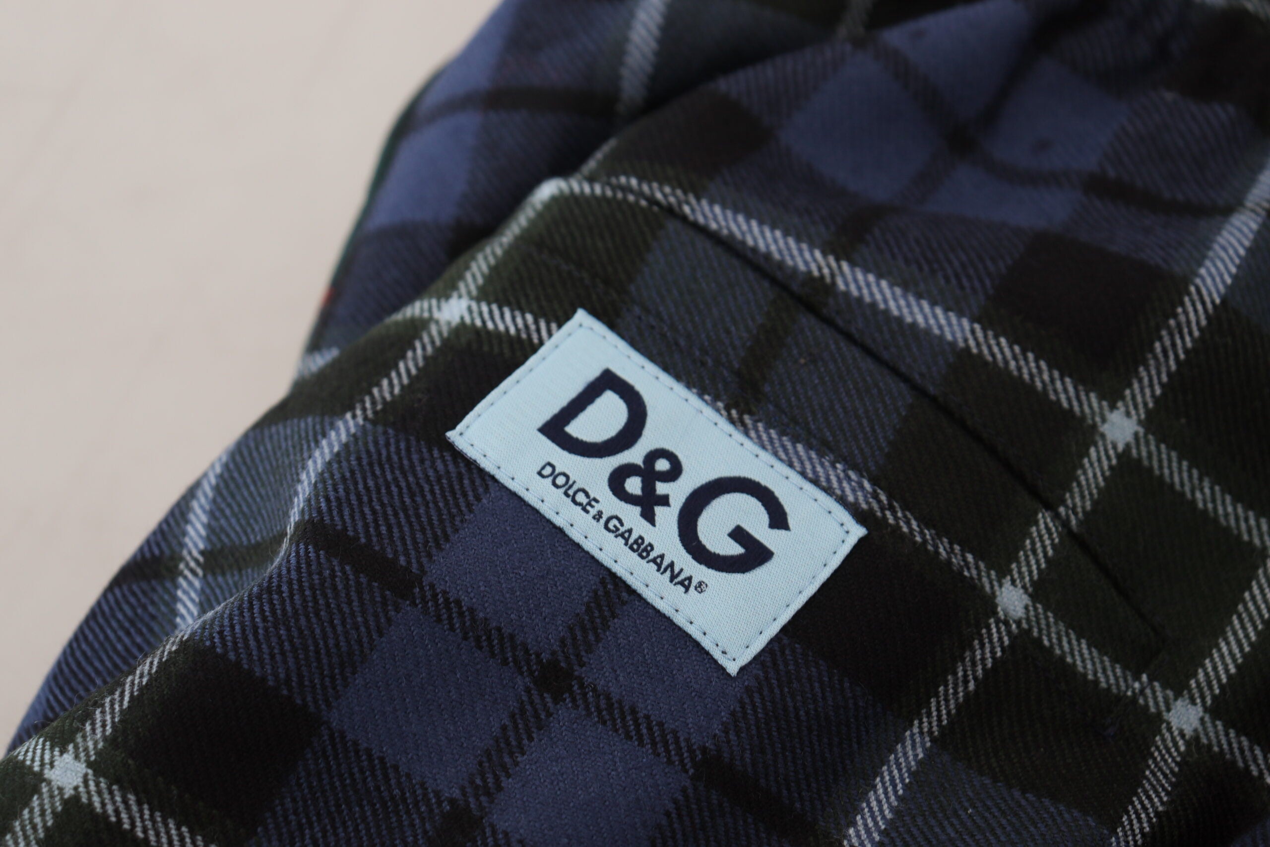 Multicolor checkered wool men's jogger pants by Dolce & Gabbana, featuring a relaxed fit and stylish pattern.