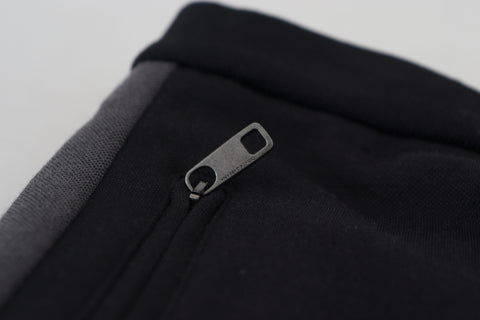 Black wool horseshoe jogger pants by Dolce & Gabbana, featuring a relaxed fit and stylish design, front view showing waistband and pockets.