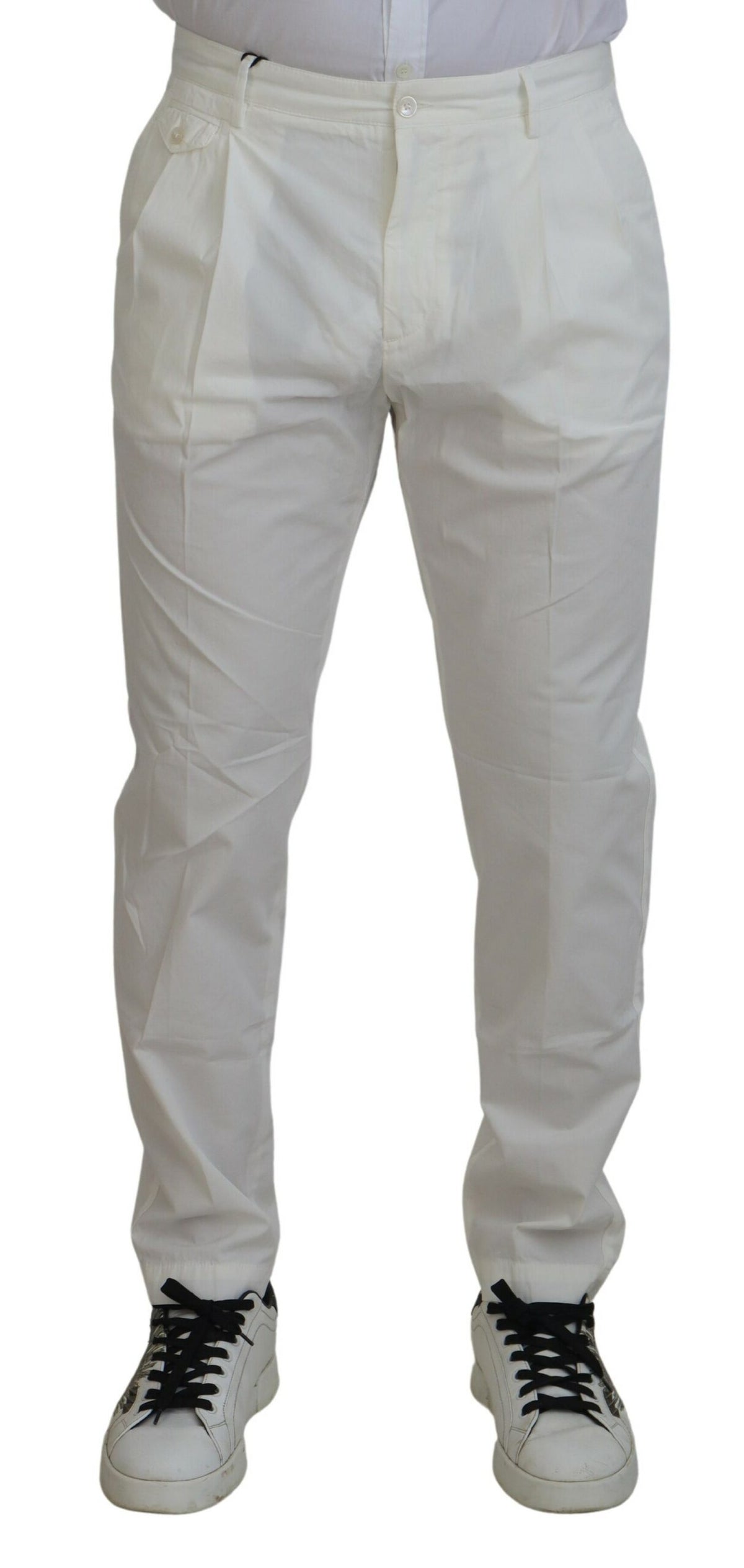 White cotton skinny chino pants by Dolce & Gabbana, close-up of fitted design and clean fabric texture.