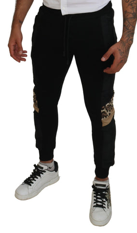 Black polyester skinny jogger pants for men by Dolce & Gabbana, featuring a slim fit and elastic waistband.