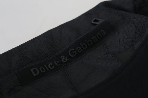 Black polyester skinny jogger pants for men by Dolce & Gabbana, featuring a tapered fit and elastic waistband.