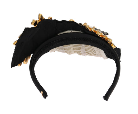 Black crystal and white hair headband diadem by Dolce & Gabbana with elegant design and sparkling embellishments.
