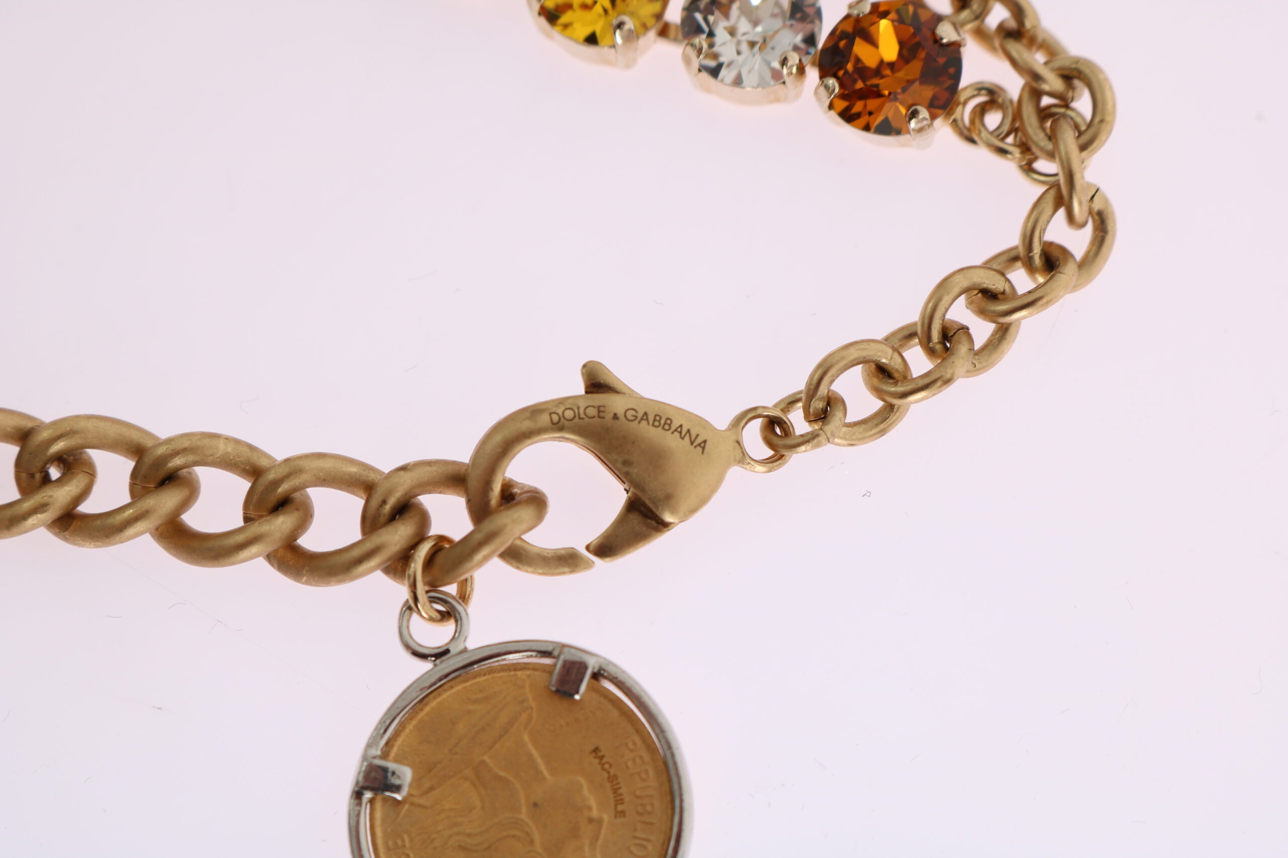 Gold brass pineapple logo statement necklace with crystal accents by Dolce & Gabbana, featuring a bold, tropical-inspired design.