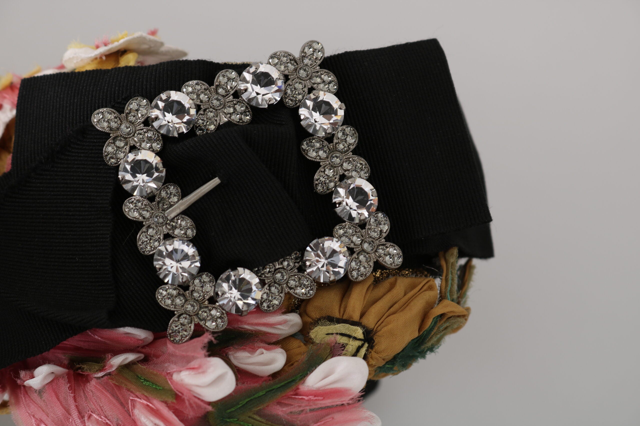 Multicolor floral crystal bow diadem headband by Dolce & Gabbana featuring a decorative tiara with vibrant flowers and sparkling crystals.