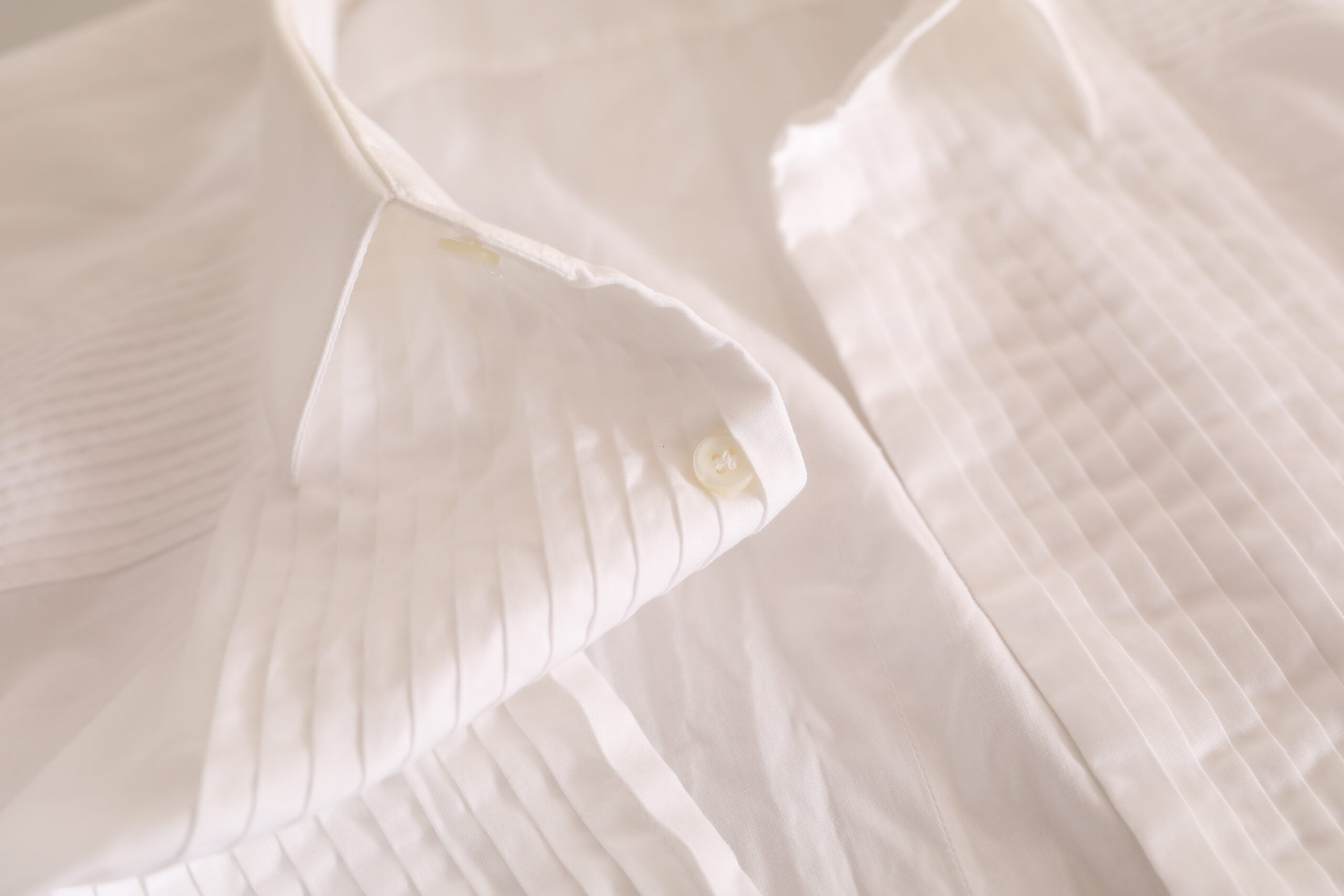 White gold formal cotton tuxedo dress shirt by Dolce & Gabbana, featuring a classic collar and button-down front.