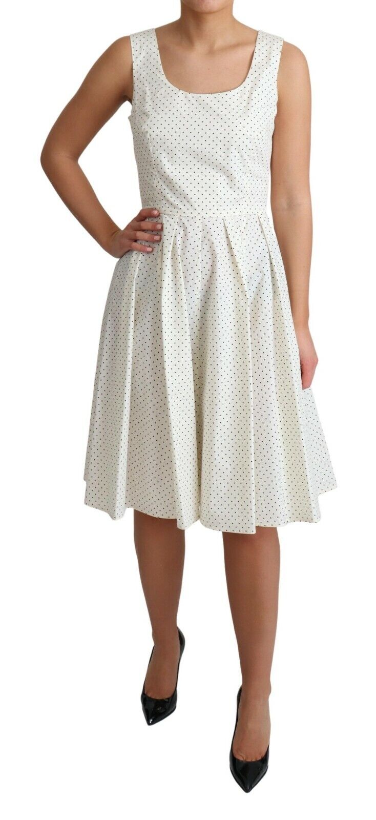 White polka dotted cotton A-line dress by Dolce & Gabbana, featuring a flattering fit and classic pattern.