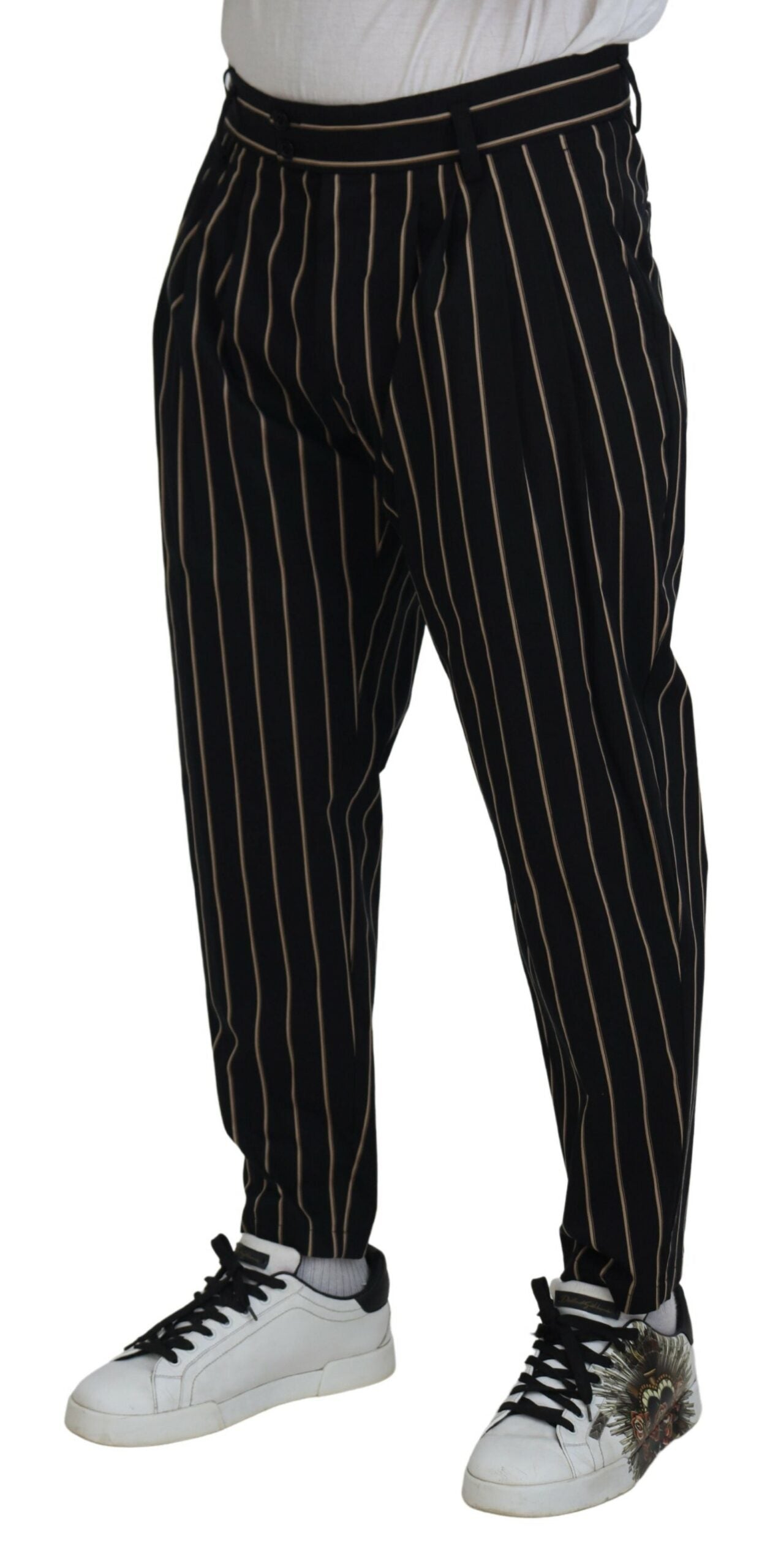 Black and beige striped cotton stretch pants by Dolce & Gabbana, featuring a fitted design and stylish pattern.