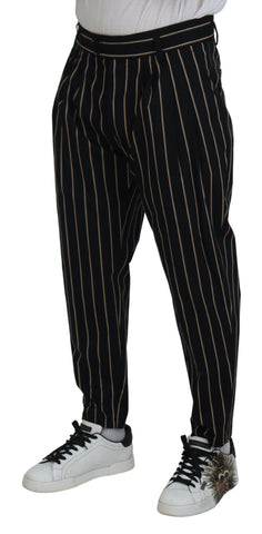 Black and beige striped cotton stretch pants by Dolce & Gabbana, featuring a fitted design and stylish pattern.