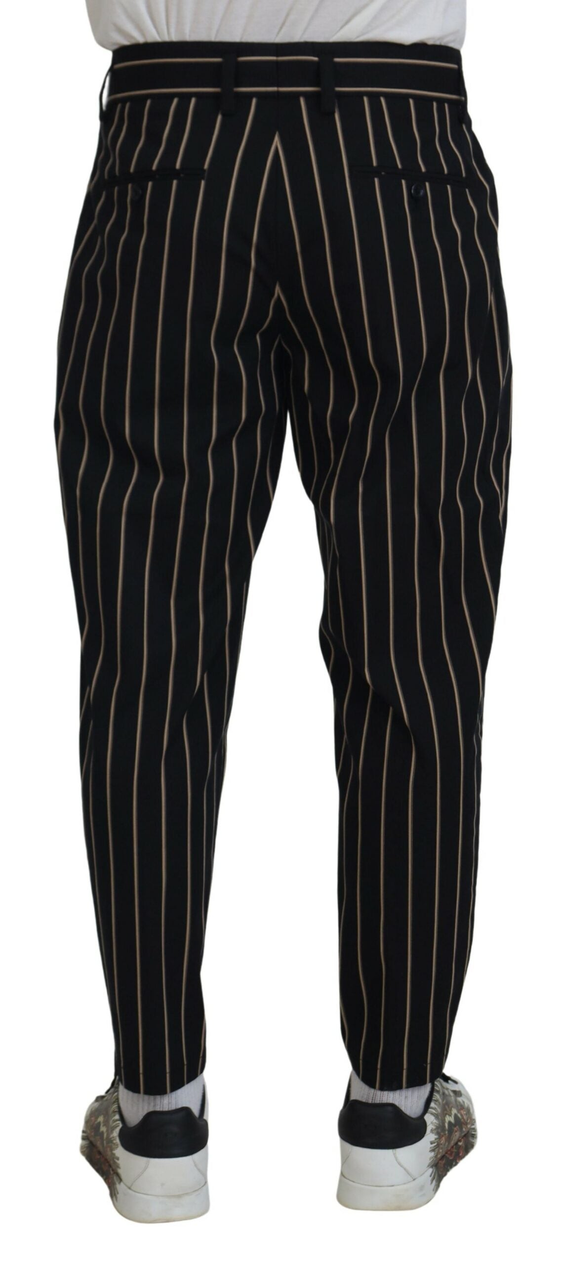 Black and beige striped cotton stretch pants by Dolce & Gabbana, showcasing a slim fit and stylish pattern.
