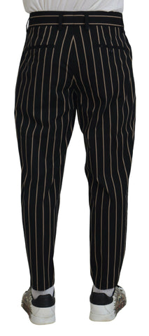 Black and beige striped cotton stretch pants by Dolce & Gabbana, showcasing a slim fit and stylish pattern.