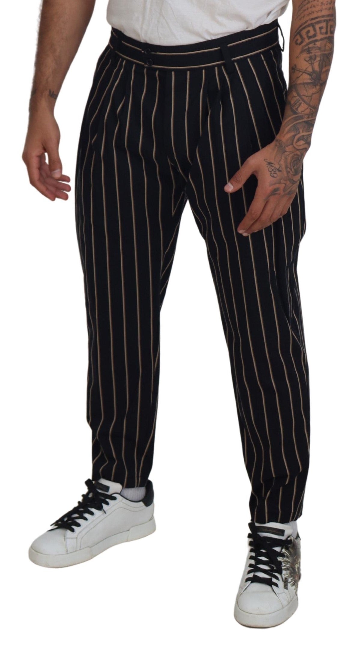 Black and beige striped cotton stretch pants by Dolce & Gabbana, featuring a fitted design and casual style.