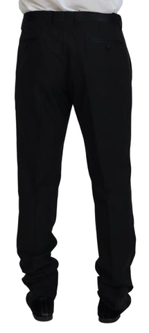 Black wool silk trouser pants by Dolce & Gabbana, featuring a tailored fit and elegant design.