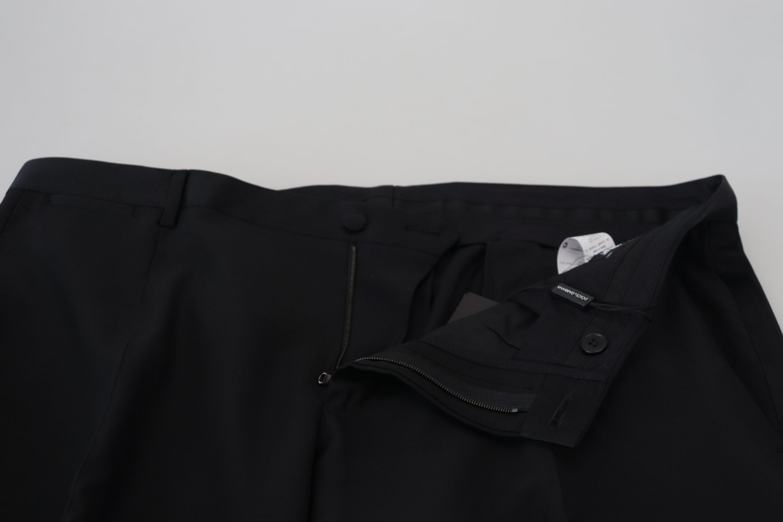 Black wool silk trouser pants by Dolce & Gabbana, tailored fit with sleek fabric and classic design.