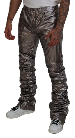 Silver metallic nylon stretch pants by Dolce & Gabbana, showcasing sleek, fitted design with shiny metallic finish.