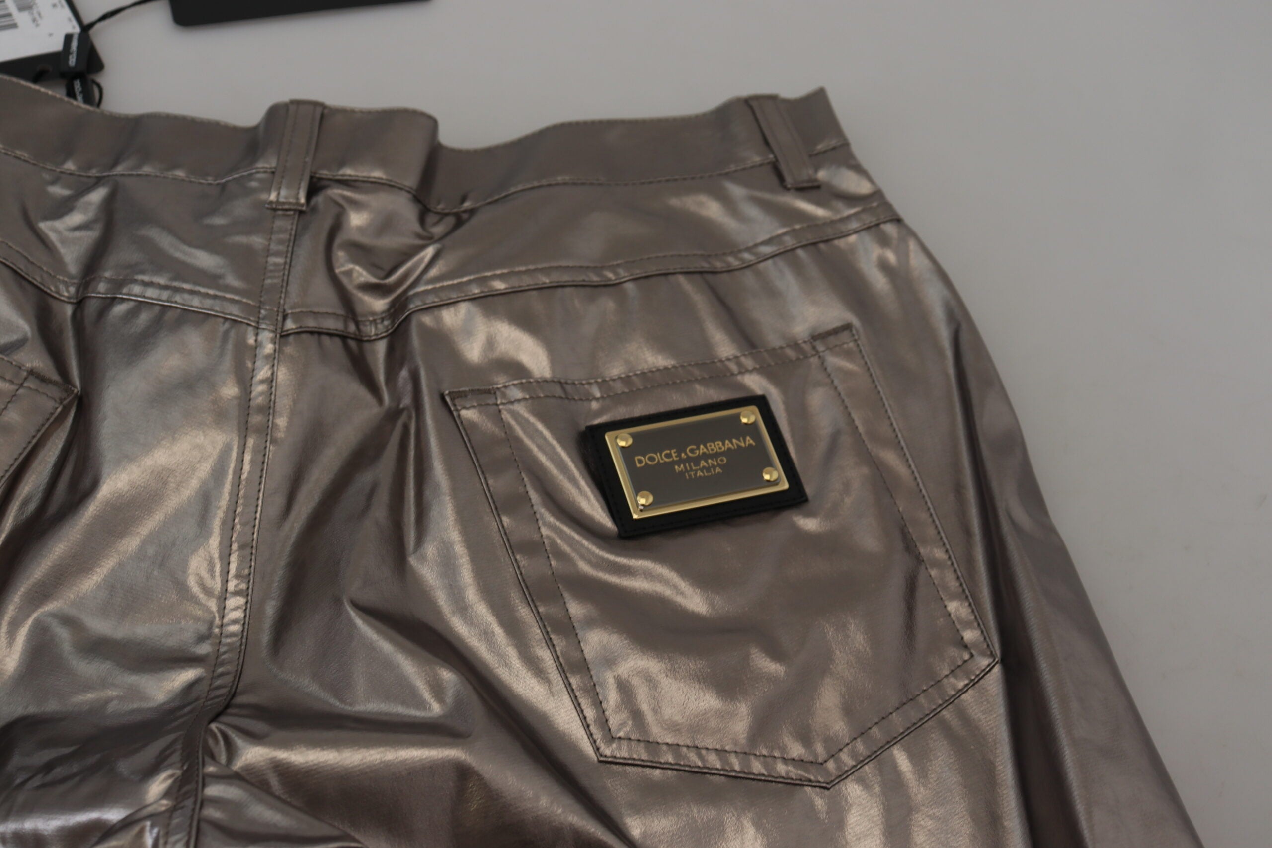Silver metallic nylon stretch pants by Dolce & Gabbana, showcasing a sleek, fitted design with a metallic sheen.