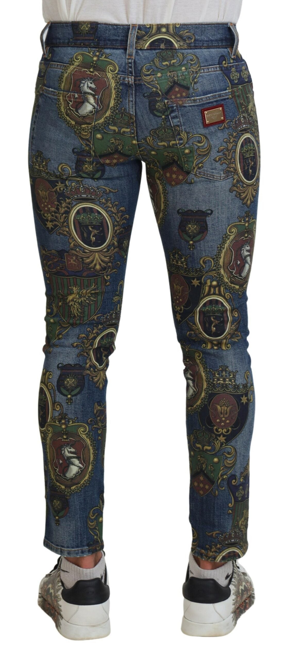 Blue Medal Print Slim Fit Cotton Jeans by Dolce & Gabbana, showing the detailed medal print design and classic five-pocket style.
