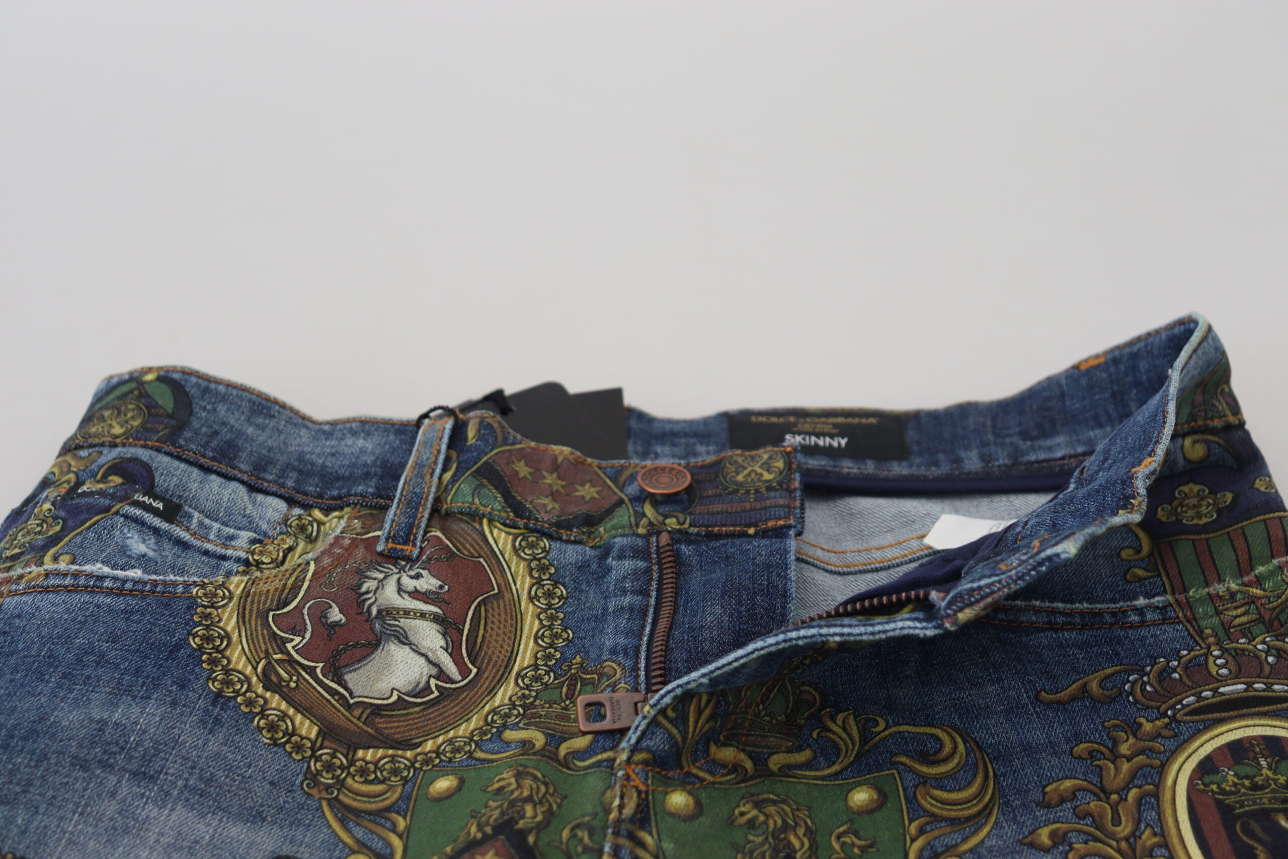Blue Medal Print Dolce & Gabbana slim fit cotton jeans with a stylish medal design and classic five-pocket style.