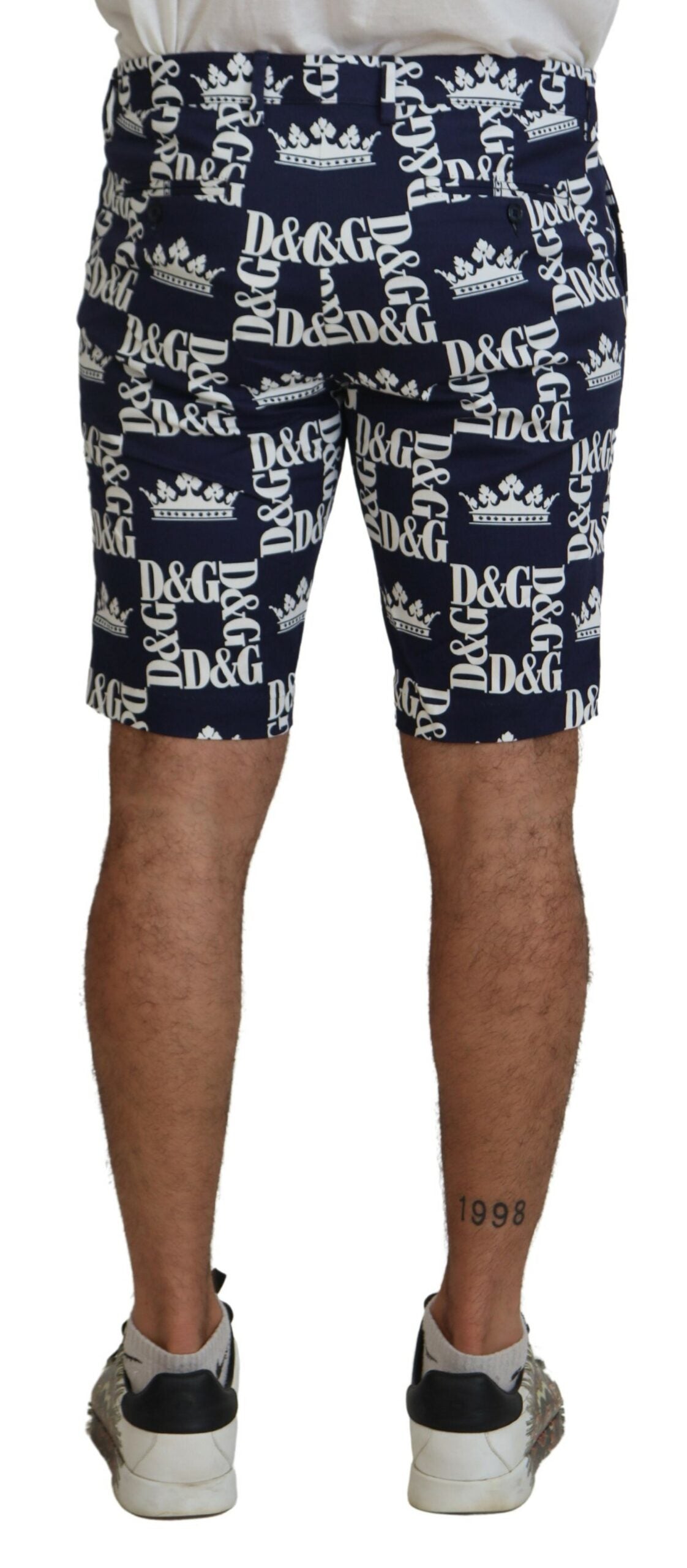 Blue cotton chino shorts with Dolce & Gabbana logo print, featuring a casual fit and stylish design.