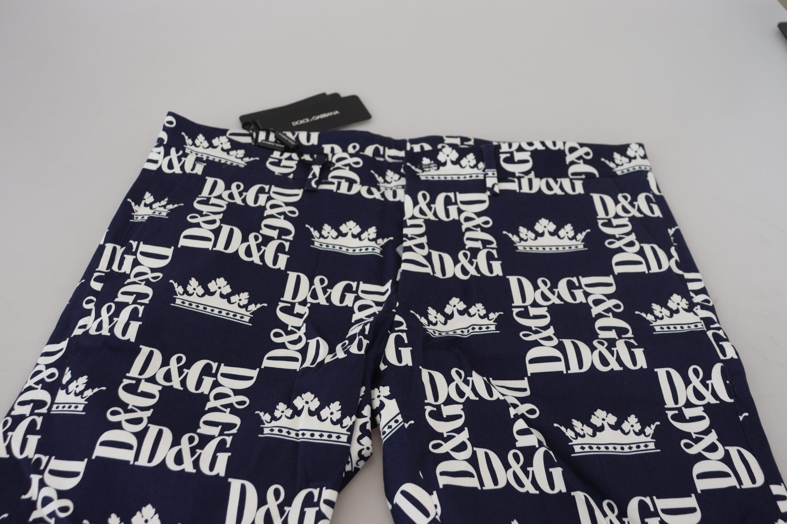 Blue Dolce & Gabbana logo print cotton chino shorts, casual men's warm-weather apparel, with front pockets and relaxed fit.