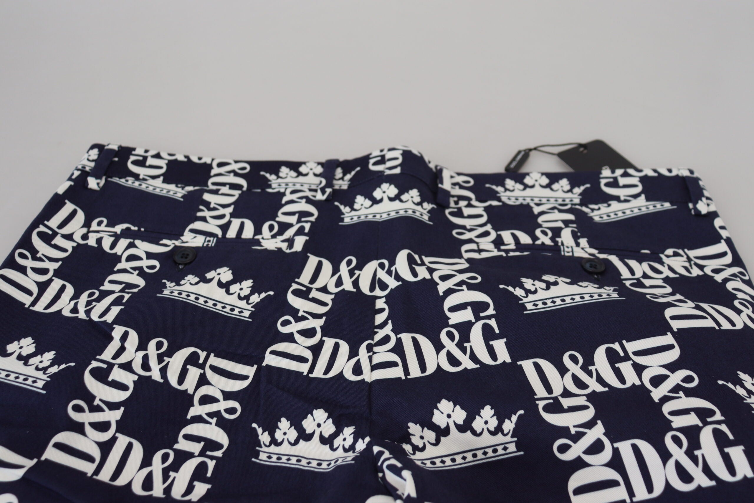 Blue Dolce & Gabbana logo print cotton chinos shorts with front pockets and tailored fit, perfect for casual summer wear.