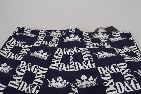 Blue Dolce & Gabbana logo print cotton chinos shorts with front pockets and tailored fit, perfect for casual summer wear.