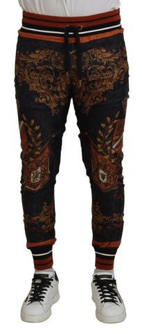 Gray silk Baroque crown sport trousers by Dolce & Gabbana with a relaxed fit and intricate pattern detail.