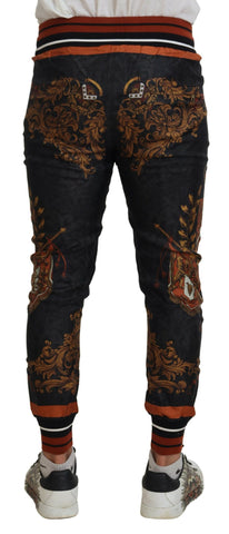Gray silk Baroque crown sport trousers by Dolce & Gabbana with a relaxed fit and intricate pattern detail.
