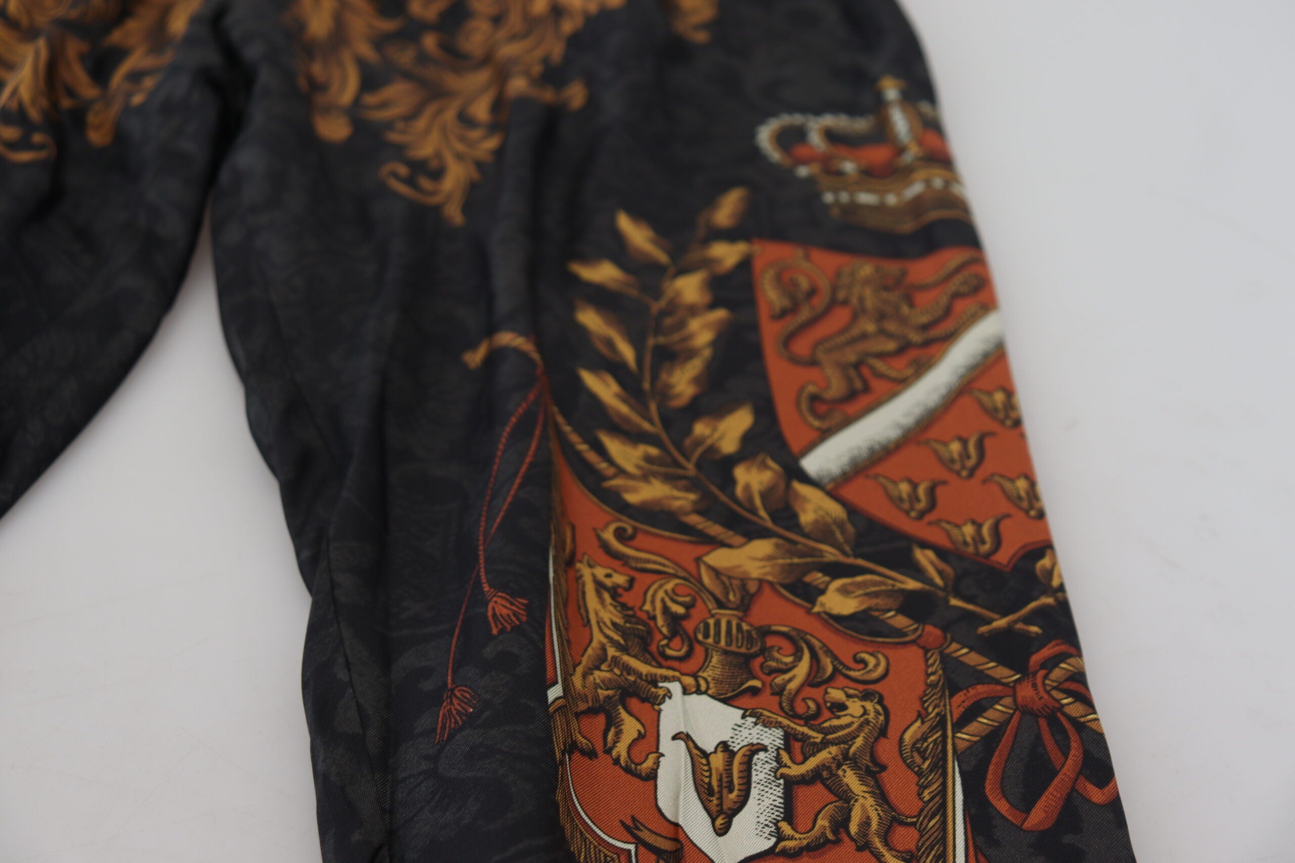 Gray silk Baroque crown design Dolce & Gabbana sport trousers with relaxed fit and stylish detailing.