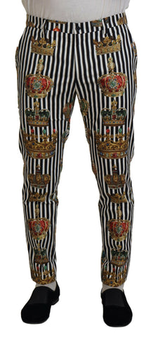 White cotton stretch crown trouser pants by Dolce & Gabbana, shown flat with a focus on the tailored fit and fabric texture.