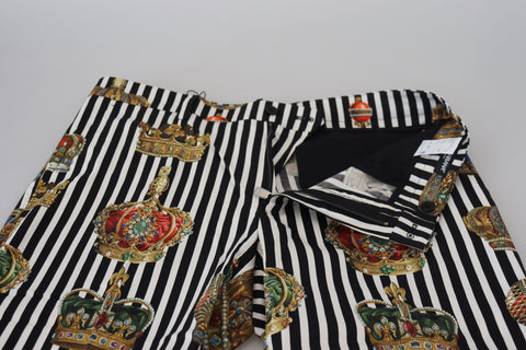 White cotton stretch crown trouser pants by Dolce & Gabbana, shown on a model with a tailored fit and classic design.