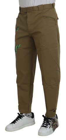 Beige cotton stretch floral chinos pants by Dolce & Gabbana, featuring a slim fit and floral print fabric.